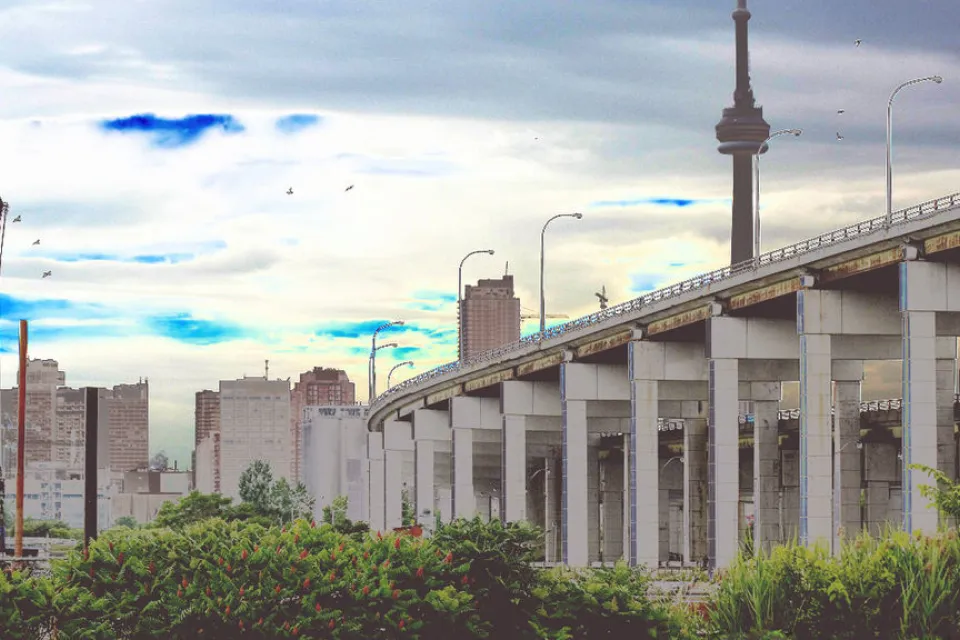 CN Tower rises above Gardiner Expressway on Toronto Waterfront